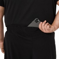 Pantalon Asics Core Woven Negro